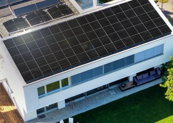 LG NeON H solar panels installed on a multi-level luxury home roof top occupying the entire surface area.