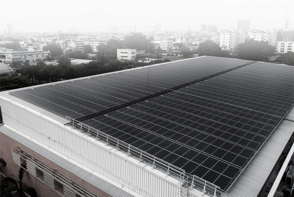 LG Mono X Plus solar modules installed on an industrial roof.